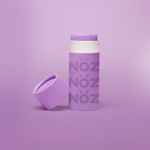 Full view of Nöz sunscreen stick in purple