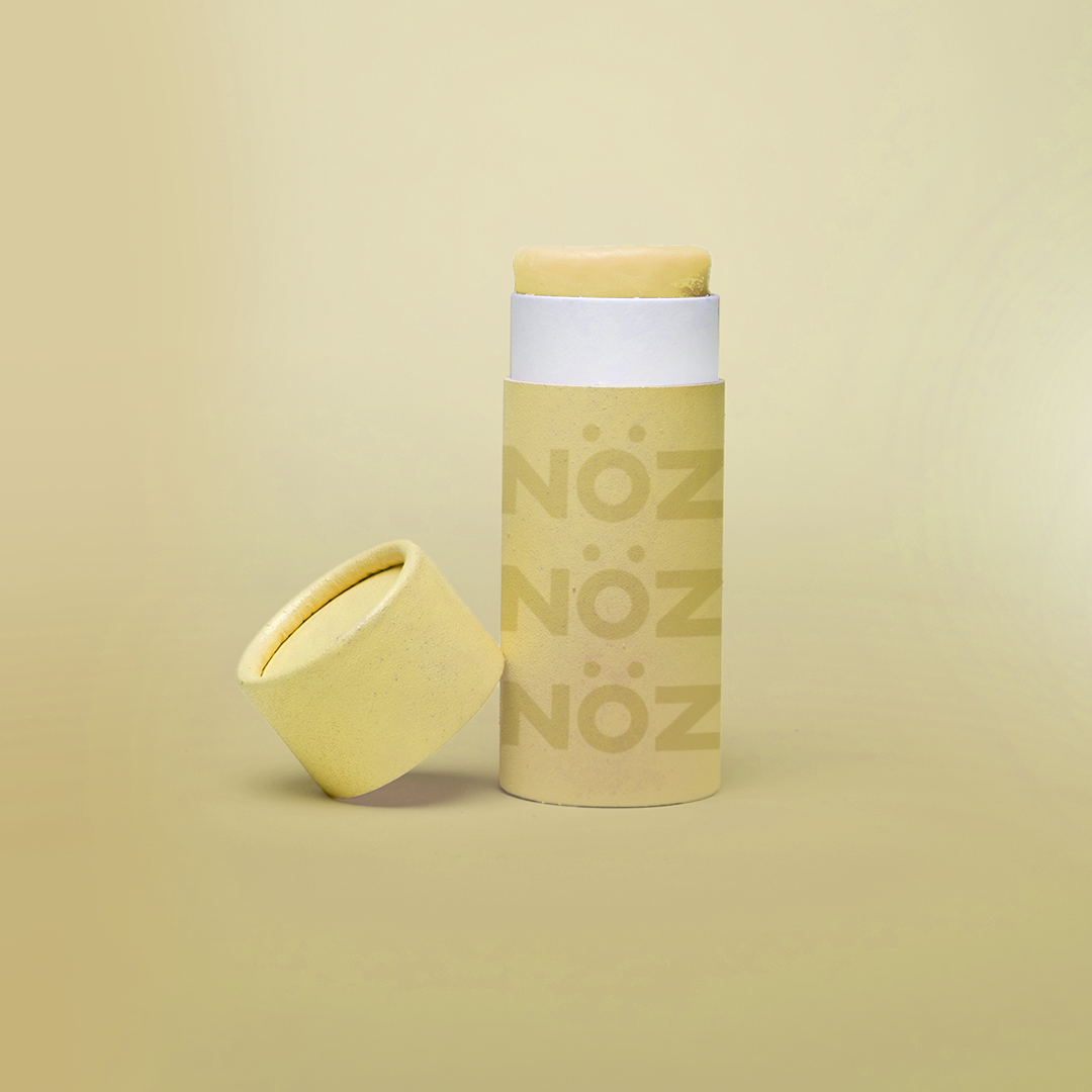 Full view of Nöz sunscreen stick in yellow