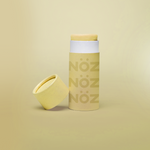 Load image into Gallery viewer, Full view of Nöz sunscreen stick in yellow
